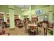 Spacious lobby with comfortable seating, elegant lighting, and flatscreen TV at 3000 Maingate Ln # 520, Kissimmee, FL 34747