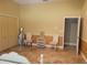 Bedroom with unique floors, seating, and closet at 3150 Appaloosa Ct, Kissimmee, FL 34746
