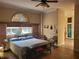 Bedroom featuring a large window and comfortable furnishings at 3150 Appaloosa Ct, Kissimmee, FL 34746