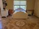 Bright bedroom with a large window and decorative floor at 3150 Appaloosa Ct, Kissimmee, FL 34746