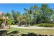 Circular driveway with tropical landscaping, adding curb appeal and convenient access to the property at 3150 Appaloosa Ct, Kissimmee, FL 34746