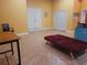 Open room with tile floors, seating, and neutral walls at 3150 Appaloosa Ct, Kissimmee, FL 34746