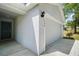 Exterior of home with garage and driveway at 328 Woodland Trl, Lady Lake, FL 32159