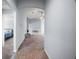 Hallway leading to the bedroom at 328 Woodland Trl, Lady Lake, FL 32159