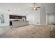Spacious open-concept layout connects the kitchen and living area, perfect for entertaining and Gathering time at 328 Woodland Trl, Lady Lake, FL 32159