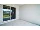Covered patio with sliding glass door at 328 Woodland Trl, Lady Lake, FL 32159