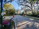 Elegant gated entrance with lush greenery and meticulous landscaping welcomes you to this exclusive community at 3687 Farm Bell Pl, Lake Mary, FL 32746