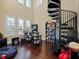 Spacious office featuring hardwood floors, large windows, and a unique spiral staircase at 3687 Farm Bell Pl, Lake Mary, FL 32746