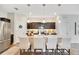 Modern kitchen with granite countertops, stainless steel appliances, and island with seating at 3807 Night Heron Dr, Sanford, FL 32773