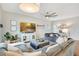 Spacious living room with comfortable seating, bright natural light, and modern decor at 3807 Night Heron Dr, Sanford, FL 32773