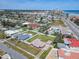 Aerial view featuring a home and its desirable location near the beach and local attractions at 385 Woodland Ave, Daytona Beach, FL 32118