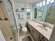 Bathroom features a walk-in shower, spacious vanity, and modern fixtures at 400 E Orlando Ave # 10 C, Ocoee, FL 34761
