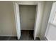 Open closet door with shelf and rod system at 403 Britten Dr, Kissimmee, FL 34758