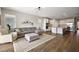 Spacious living room featuring stylish decor and an open layout with hardwood flooring and recessed lighting at 4439 Davos Dr, Clermont, FL 34711