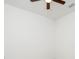 Bright bedroom featuring neutral tile flooring, white walls, a window with blinds, and a modern ceiling fan at 4765 Sw 128Th St, Ocala, FL 34473