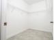 Walk-in closet with wire shelving for optimal storage at 4765 Sw 128Th St, Ocala, FL 34473
