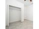 Open closet with shelving and tile flooring inside a bright room at 4765 Sw 128Th St, Ocala, FL 34473