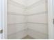 Spacious walk-in pantry with wire shelving on all sides for maximum storage and organization at 4765 Sw 128Th St, Ocala, FL 34473