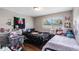 Cozy bedroom featuring two beds, bright natural light from the window, and playful decor at 4915 Pocahontas Ln, Lakeland, FL 33810