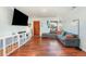 Bright living room boasts hardwood floors, recessed lighting, and a comfortable seating area with a large sectional sofa at 6 Winding Ridge Rd, Casselberry, FL 32707