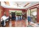 Bright recreation space offers natural light with tiled floors and sliding doors leading to an outdoor patio at 6 Winding Ridge Rd, Casselberry, FL 32707