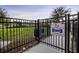 Fenced community dog park at Vineyards of Horizons West with grassy area and signage at 6024 Soter Ln, Windermere, FL 34786