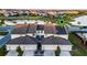 Aerial view of townhomes with solar panels and garages at 6024 Soter Ln, Windermere, FL 34786