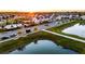 Beautiful neighborhood with a community pool, walking path, and a tranquil pond at 6024 Soter Ln, Windermere, FL 34786