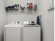 Practical laundry room with modern washer and dryer at 6024 Soter Ln, Windermere, FL 34786