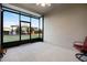 Enclosed patio space with ceiling fan and views of the backyard lawn at 6024 Soter Ln, Windermere, FL 34786