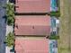 Aerial view of homes with screened pools showcasing the community's resort-style amenities at 631 Tuscan Hills Blvd, Davenport, FL 33897