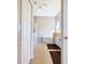Neutral-toned bathroom with tile flooring, dual sink vanity, and separate tub and shower at 631 Tuscan Hills Blvd, Davenport, FL 33897