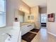 Ensuite bathroom with shower, tub, dual sinks, and neutral tones at 631 Tuscan Hills Blvd, Davenport, FL 33897