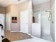 Bathroom featuring walk-in shower, double sinks, and separate tub at 631 Tuscan Hills Blvd, Davenport, FL 33897