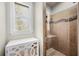 Bathroom with a glass-enclosed shower, decorative tile, and a modern vanity at 743 Mills Estate Pl, Chuluota, FL 32766