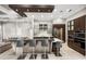 Modern kitchen featuring stainless steel appliances, sleek cabinetry, and a large island with seating at 743 Mills Estate Pl, Chuluota, FL 32766