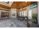 Covered patio with dining area, ceiling fan, and seamless access to indoor living spaces at 743 Mills Estate Pl, Chuluota, FL 32766