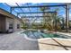 Backyard pool with a spa and screened enclosure for year-round enjoyment at 743 Mills Estate Pl, Chuluota, FL 32766