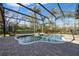 Enclosed pool area with mature landscaping creating a private oasis at 743 Mills Estate Pl, Chuluota, FL 32766