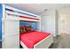 bedroom featuring a bunk bed, gray vinyl floors and a built-in wardrobe with plenty of storage space at 8959 Stinger Dr, Champions Gate, FL 33896