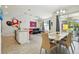 Bright living area seamlessly connected to the kitchen and dining, ideal for modern living at 8959 Stinger Dr, Champions Gate, FL 33896