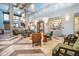 Spacious lobby with comfortable seating, stylish decor, and high ceilings at 8959 Stinger Dr, Champions Gate, FL 33896