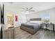 Bright main bedroom with a ceiling fan, closet, and ensuite bathroom at 8959 Stinger Dr, Champions Gate, FL 33896