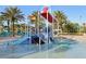 Entertaining splash pad featuring multiple slides, climbing structures, and water features at 8959 Stinger Dr, Champions Gate, FL 33896