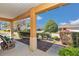 Inviting porch with cozy seating and a pleasant view of the neighborhood at 9491 Sw 98Th Ct, Ocala, FL 34481