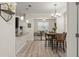 Open-concept dining area adjacent to the kitchen, perfect for Gathering meals at 9844 Pecan Hickory Way, Orlando, FL 32832
