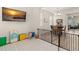 Living area featuring a dining area, and a safety gate at 9844 Pecan Hickory Way, Orlando, FL 32832