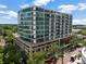 Stylish condominium building showcasing modern design with expansive windows and private balconies at 101 S Eola Dr # 910, Orlando, FL 32801