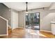 Bright dining area with a modern light fixture and sliding glass doors to the outside at 1120 Portland Ave # 2, Orlando, FL 32803