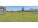 Expansive backyard with lush lawn and a tranquil atmosphere offering serene living at 144 Jones Fish Camp Rd, Edgewater, FL 32141